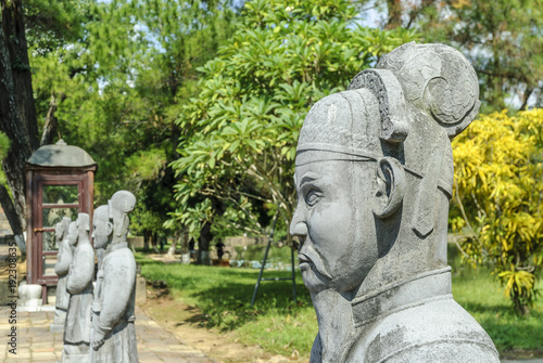 sculptures inside the complex of the mausoleum of the emperor Minh Mang in Hue, Vietnam.