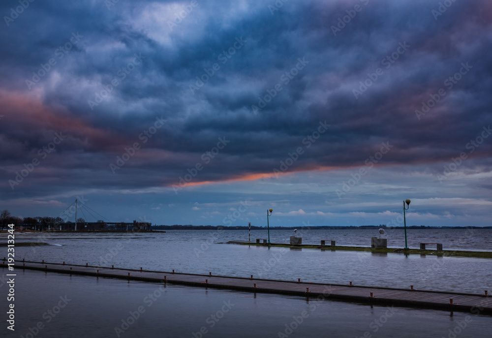 Storm clouds over the Niegocin lake in Gizycko, Masuria, Poland