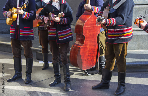 Croatian tamburitza musicians in traditional Croatian folk costumes