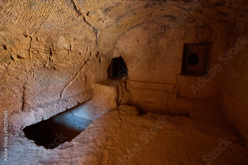 ancient burial chamber at the 'Tomb of the Kings in Paphos, Cyprus Fototapet