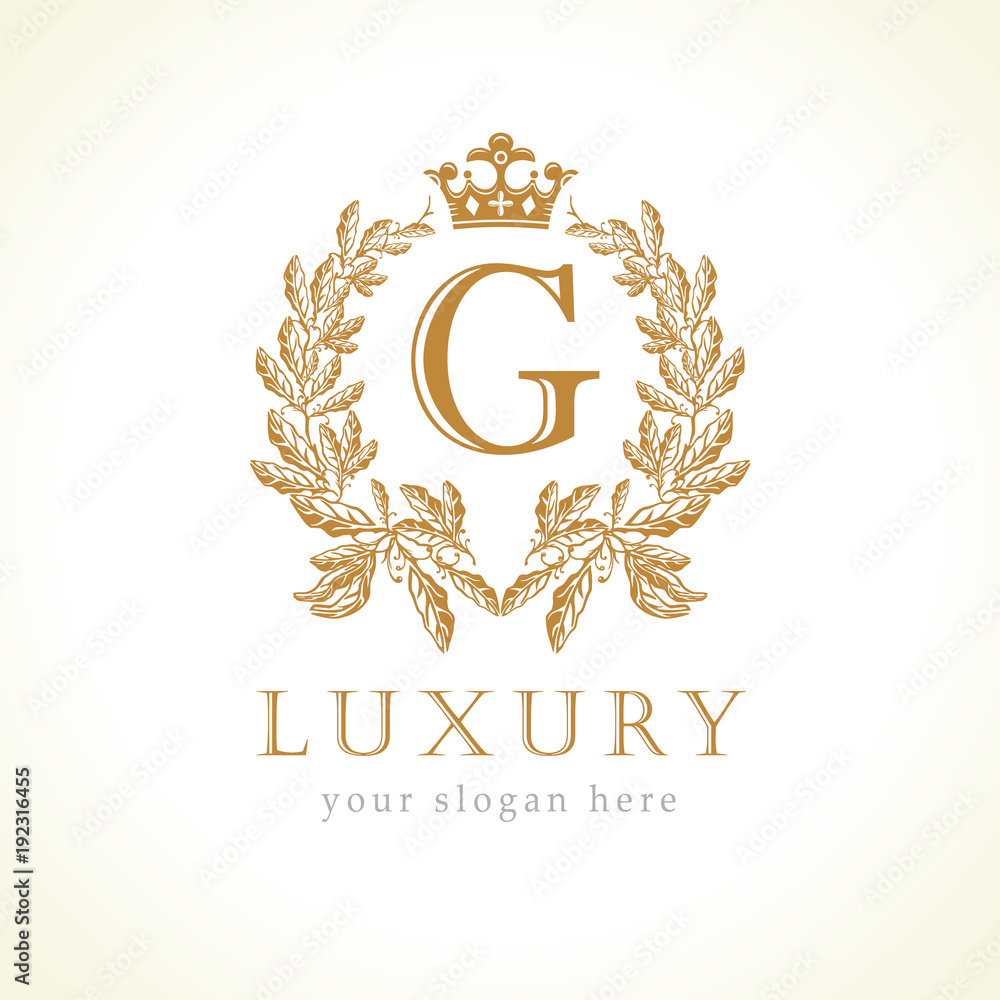Luxury G letter and crown monogram logo. Laurel elegant beautiful round