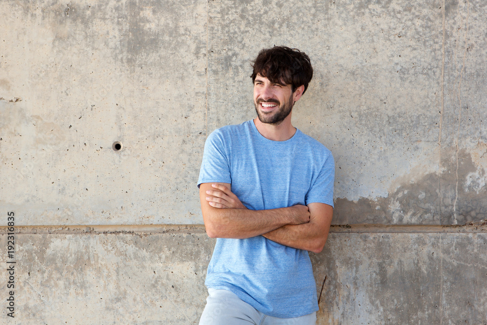 attractive young man with beard smiling attractive young man with beard smiling