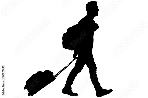 Traveler with suitcase and backpack