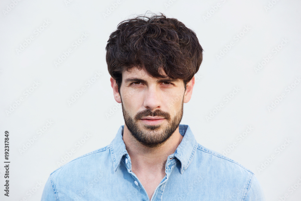 Obraz premium Close up handsome male fashion model face with beard
