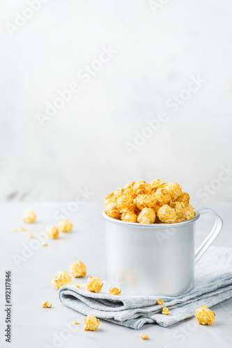Sweet caramel popcorn for party or cinema at home