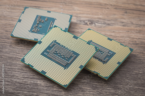 CPU microprocessor for desktop on wooden background.