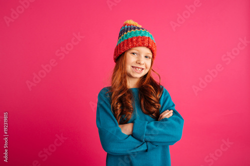 Cheerful girl looking camera and smiling isolated