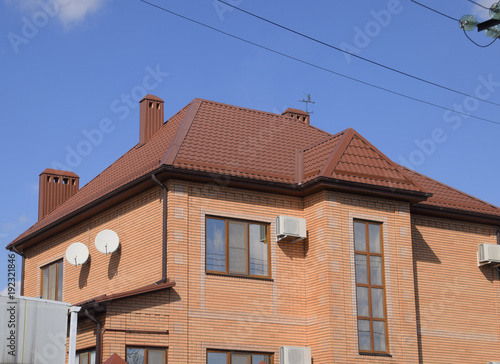 Decorative metal on the roof of the house.