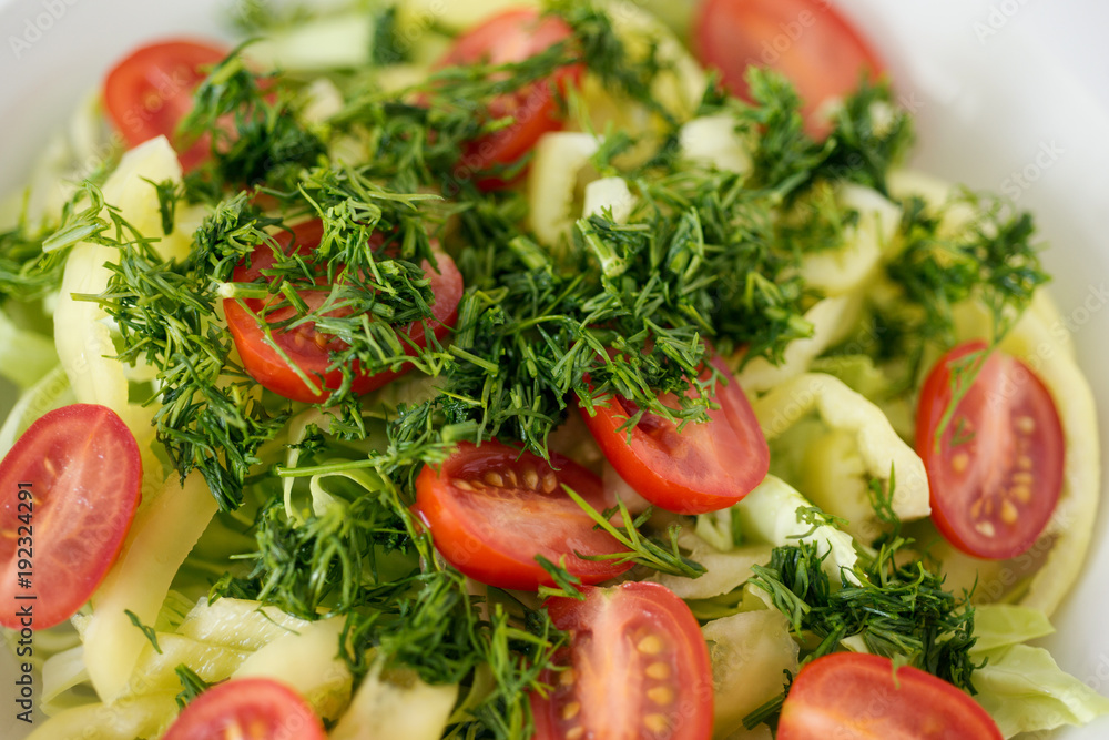 Salad from fresh vegetables sprinkled with dill. Raw food Salad from fresh vegetables sprinkled with dill. Raw food