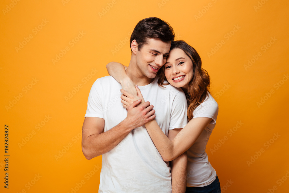 Portrait of a lovely young couple hugging Portrait of a lovely young couple hugging