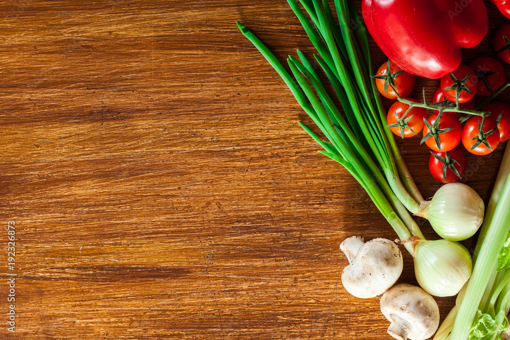 Fresh vegetable borders on wooden background Fresh vegetable borders on wooden background