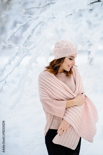 Beautiful woman enjoys the snow. A fabulous winter. Christmas holiday. All in the snow.