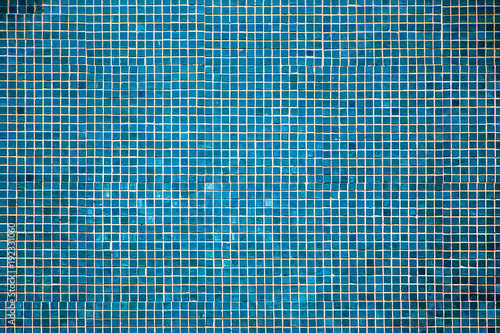 Detail shot of wall mosaic tiles in turquoise for background, high resolution, real photo