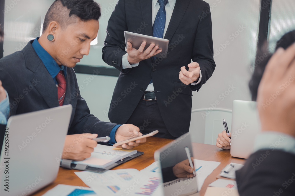 business people having meeting. businessman, businesswoman working with financial chart report. startup man & woman discussing market plan at workplace. discussion, teamwork, collaboration, corporate business people having meeting. businessman, businesswoman working with financial chart report. startup man & woman discussing market plan at workplace. discussion, teamwork, collaboration, corporate