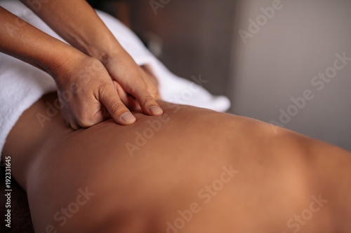 Woman getting massage spa treatment