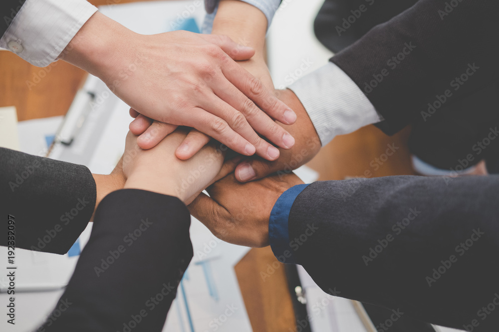businessman joining hand, business team touching hands together - unity, harmony, teamwork, partnership, collaboration, corporate concept. businessman joining hand, business team touching hands together - unity, harmony, teamwork, partnership, collaboration, corporate concept.