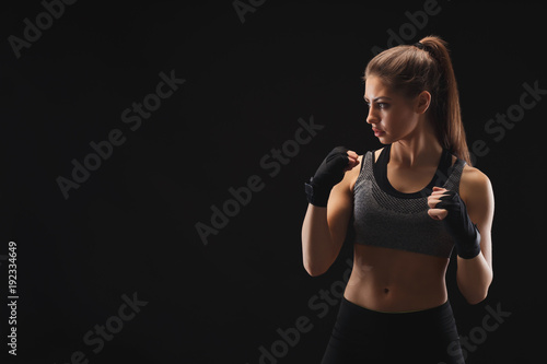Gorgeous young woman with boxing bandage © Prostock-studio