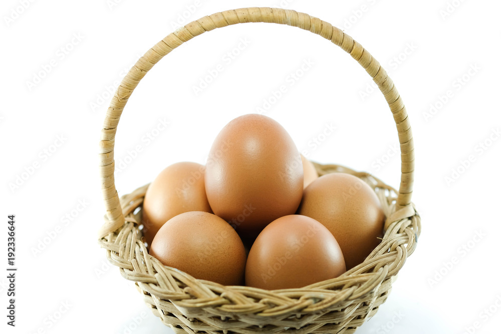 Close up of egg in the basket with isolate use as texture and background for food including holiday concept Close up of egg in the basket with isolate use as texture and background for food including holiday concept