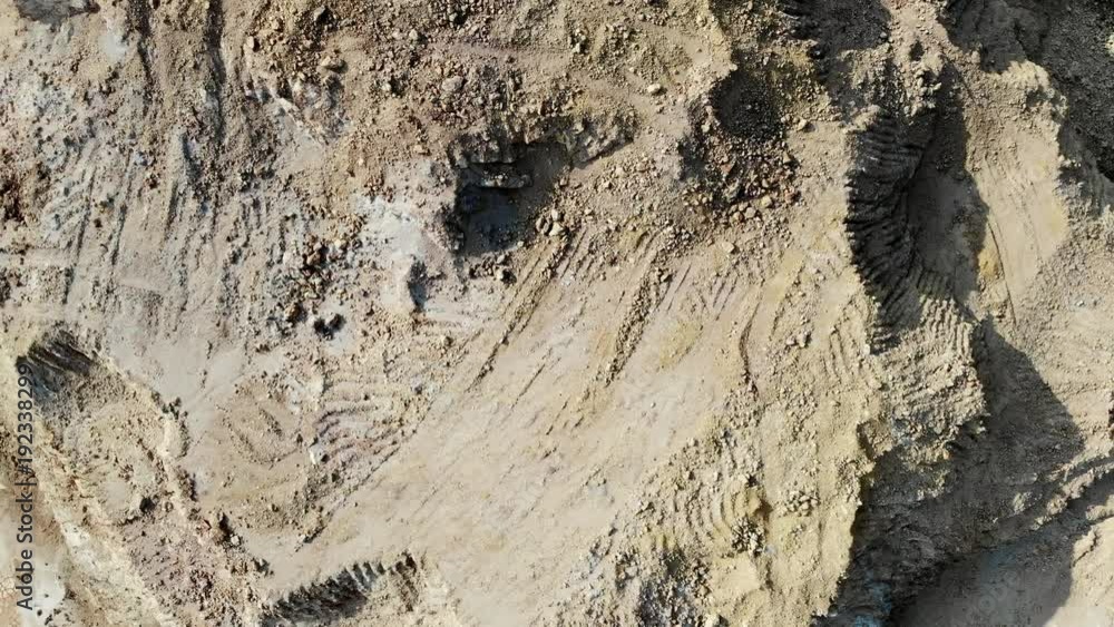 Mountain of sand, clay and stones shooting from aircraft drone camera movement to the right, rotation. Mountain of sand, clay and stones shooting from aircraft drone camera movement to the right, rotation.