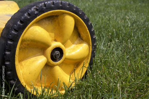 lawnmower wheel in grass