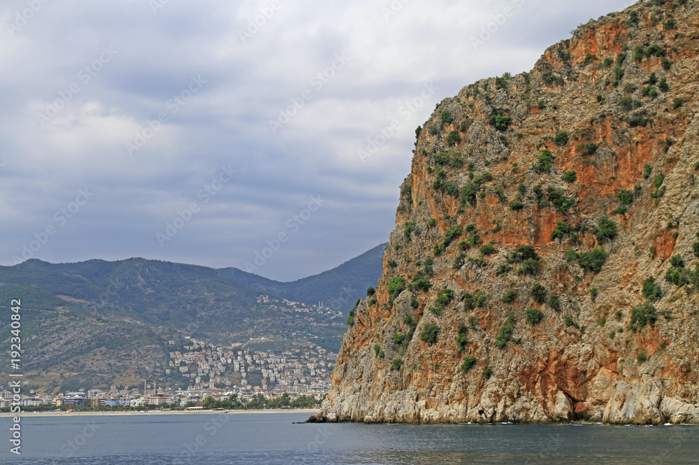 Seascape with Alanya's castle rock peninsula and mountains