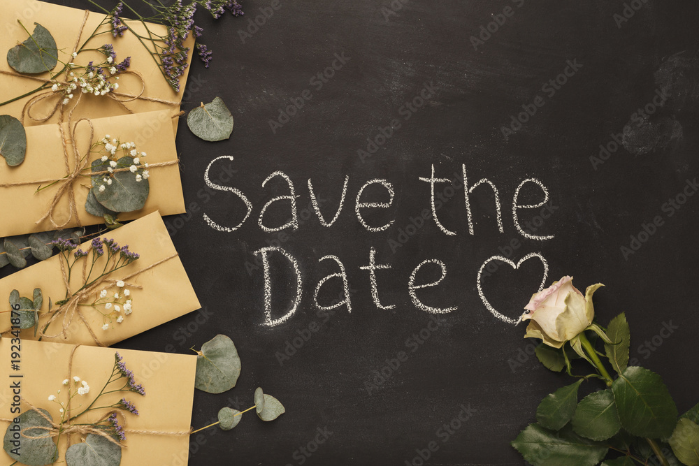 Fototapeta premium Border of wedding envelopes on black background