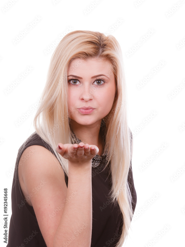 Naklejka premium Blonde woman sending air kiss on palm hand