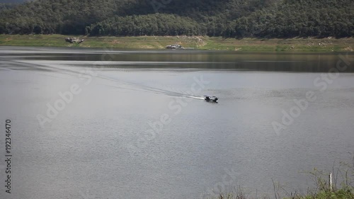 Travel ship in Mae Ngad dam, Location about 40 km north of Chiangmai city, Maetang District, Chiangmai, Thailand.  photo