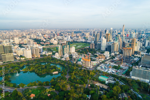 Modern city downtown of Bangkok with green public park