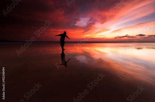 beautiful sunset colors with reflection. image contain soft focus due to long expose.