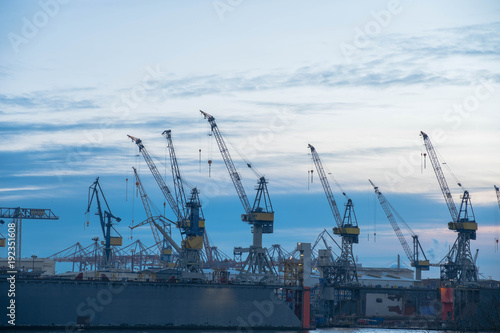 Hamburg, Germany. River station of the city against the backdrop of the river Elbe and port cargo grains