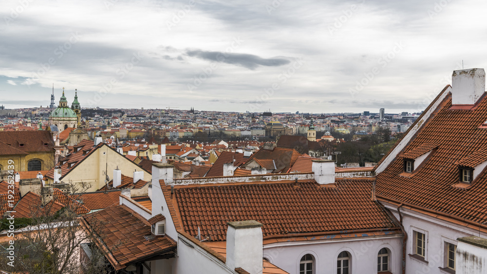 Clouds over the tile roofs of Prague