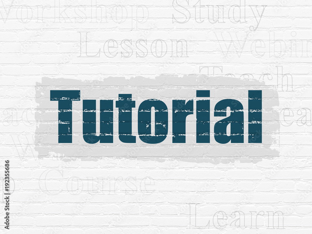 Learning concept: Painted blue text Tutorial on White Brick wall background with Tag Cloud Learning concept: Painted blue text Tutorial on White Brick wall background with Tag Cloud