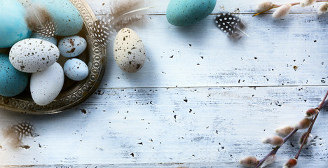  Easter background with Easter eggs on white table