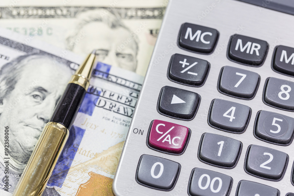 Money, calculator, notepad and pen Money, calculator, notepad and pen