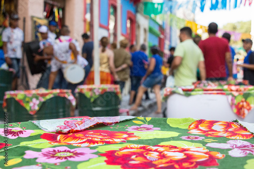A bar table with colorful tablecloth, Brazil.