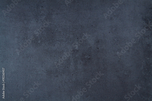 Flat dark grey texture of tiling stone background