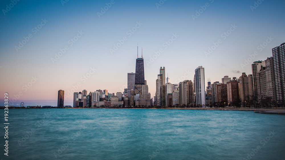 Panorama Sunset Skyline Chicago with blue Lake Michigan 