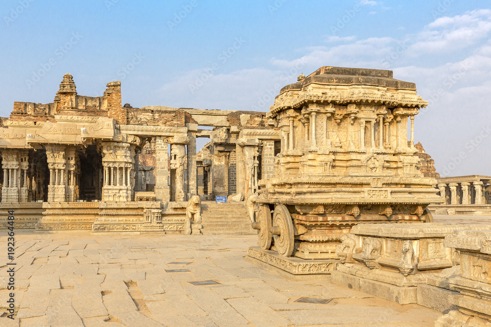 Garuda stone chariot and Vitthala temple gopuram, Hampi, Karnataka, India