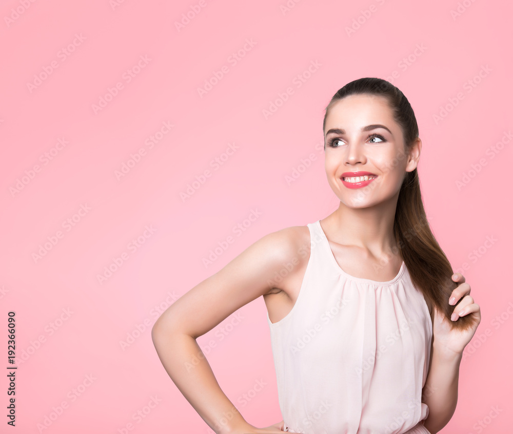 beautiful young woman with long hair posing on background with copy space beautiful young woman with long hair posing on background with copy space