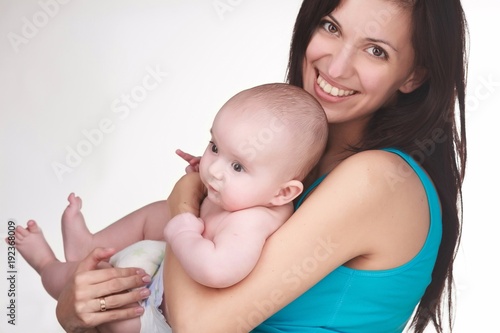 happy mother holding baby