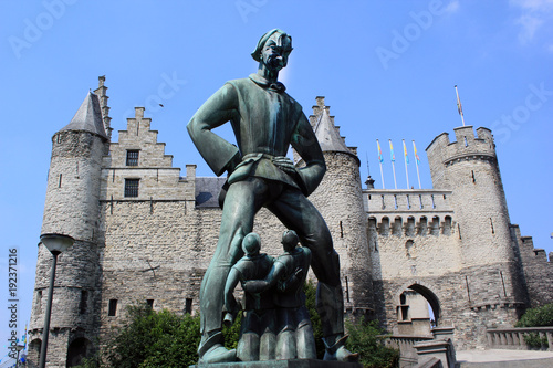 Belgium, Flanders, Antwerp, Statue of Lange Wapper outside Maritime Museum, Steen Castle photo