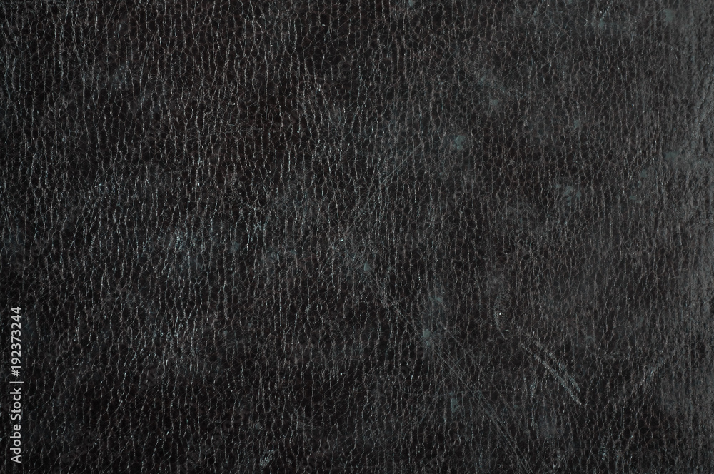dark grunge scratched leather to use as background dark grunge scratched leather to use as background