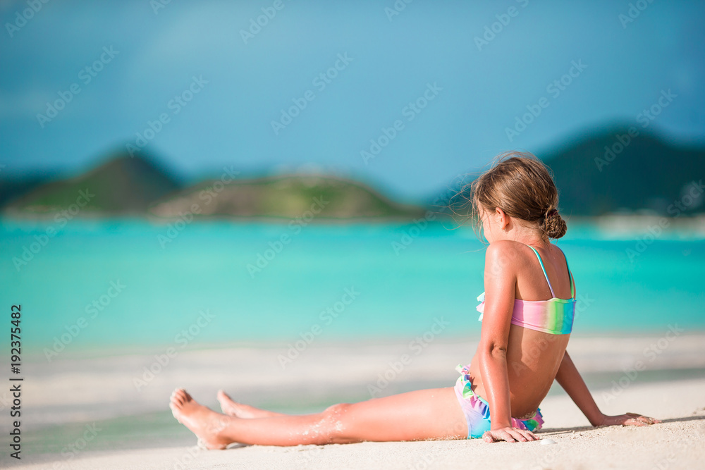 Adorable little kid on the beach