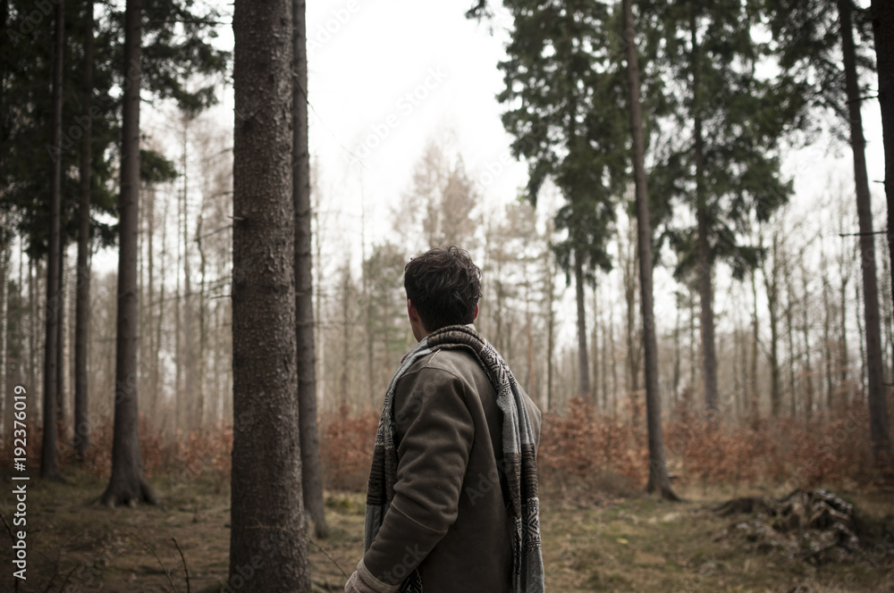 Man standing in the forest Man standing in the forest