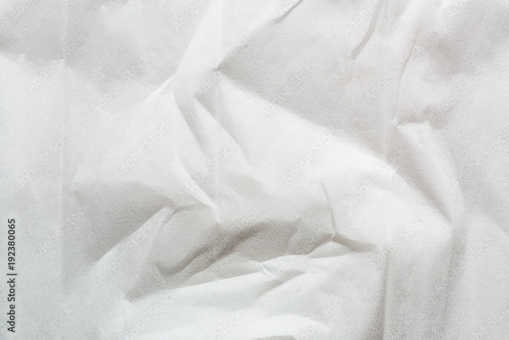  white crinkled paper textured background.
