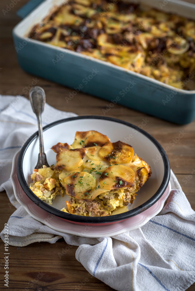 Prepred and served traditional Greek moussaka in the plate,selective focus Prepred and served traditional Greek moussaka in the plate,selective focus