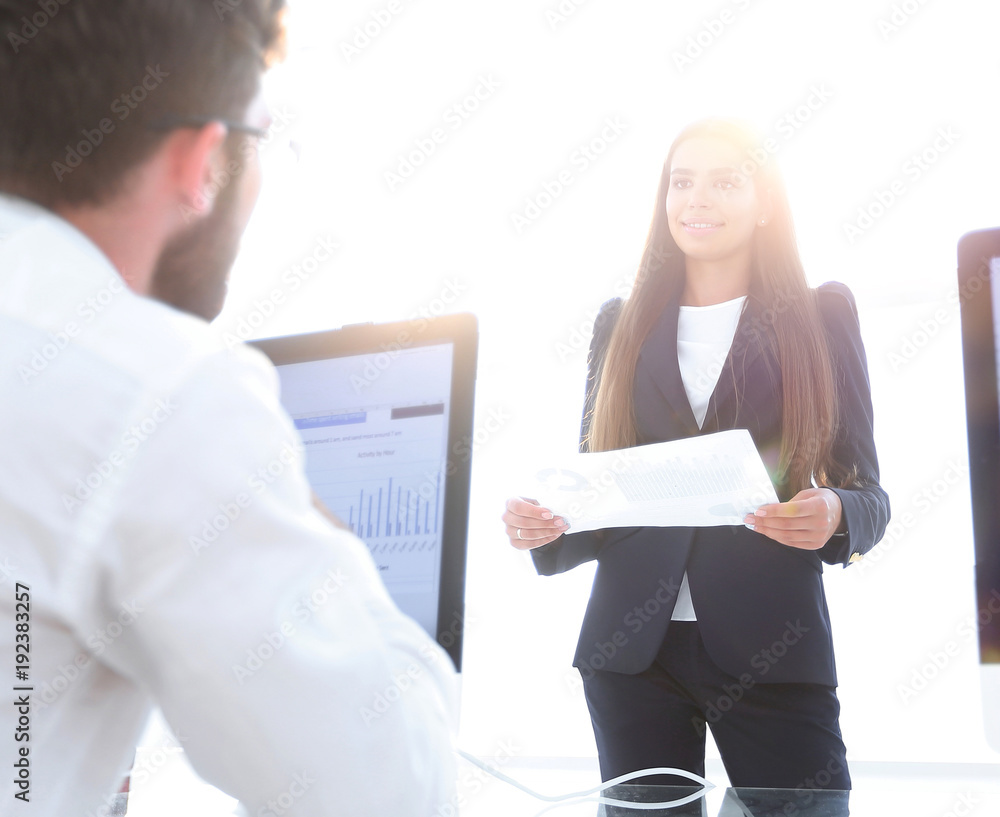business colleagues discussing documents in the office. business colleagues discussing documents in the office.