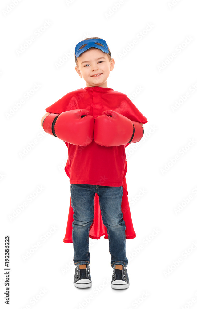 Cute boy in superhero costume on white background Cute boy in superhero costume on white background