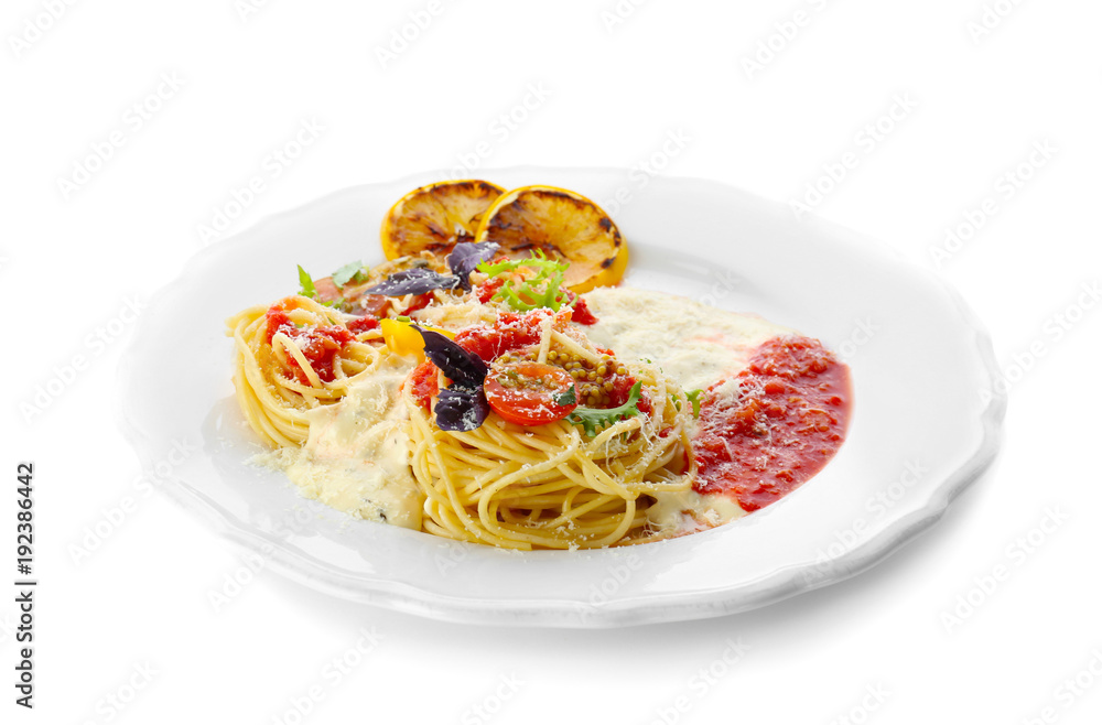 Delicious pasta with tomato sauce and vegetables on plate against white background Delicious pasta with tomato sauce and vegetables on plate against white background